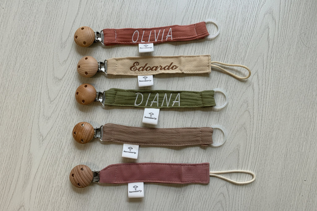 Catenella per ciuccio con clip in legno