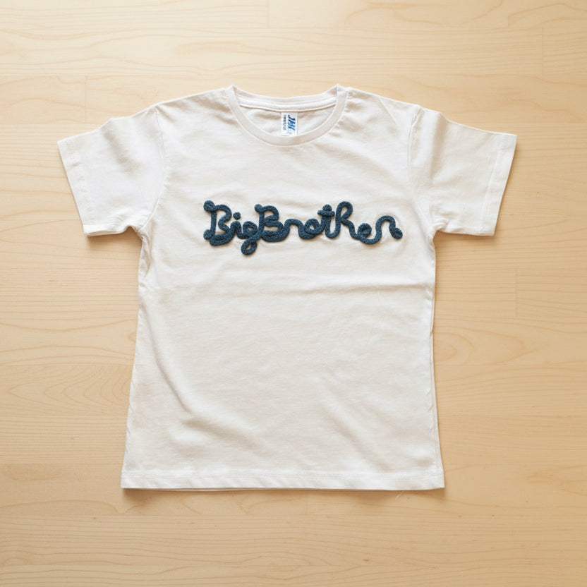 Maglietta con scritta in tricotin