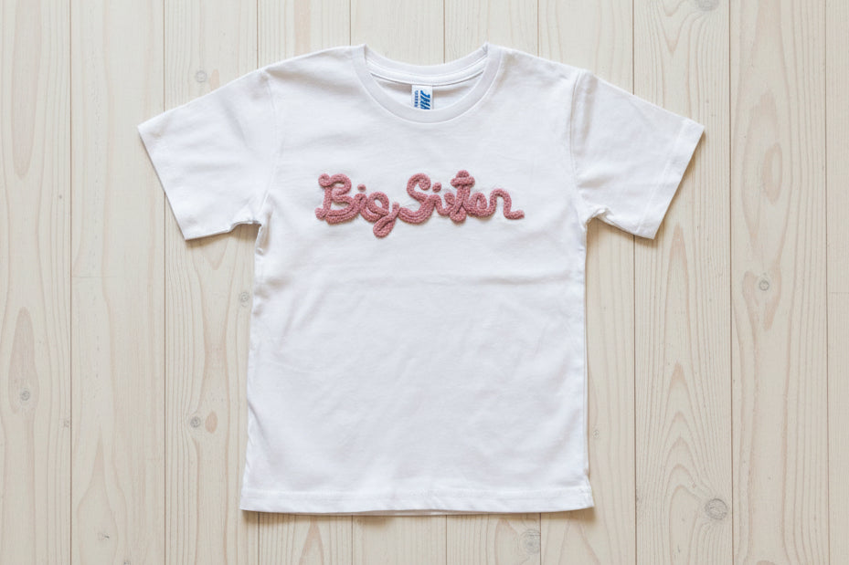 Maglietta con scritta in tricotin